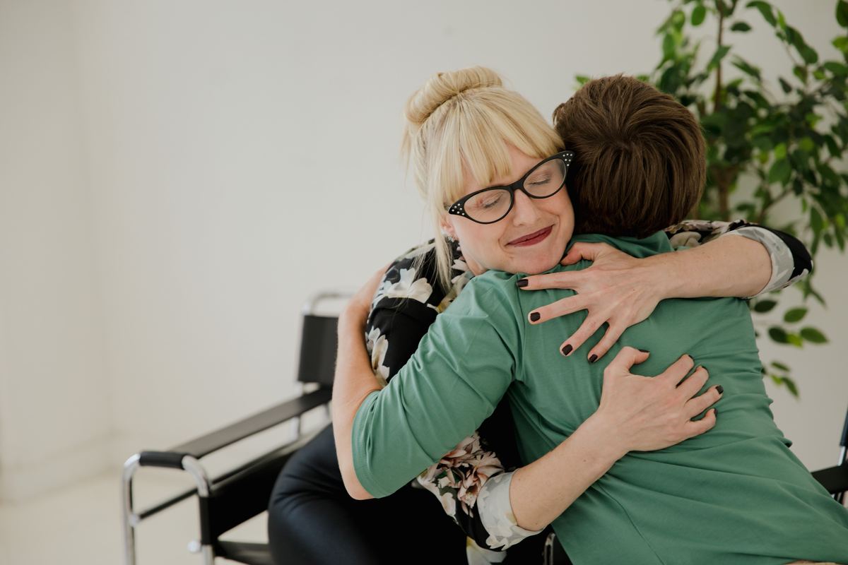 Two people sharing a warm embrace